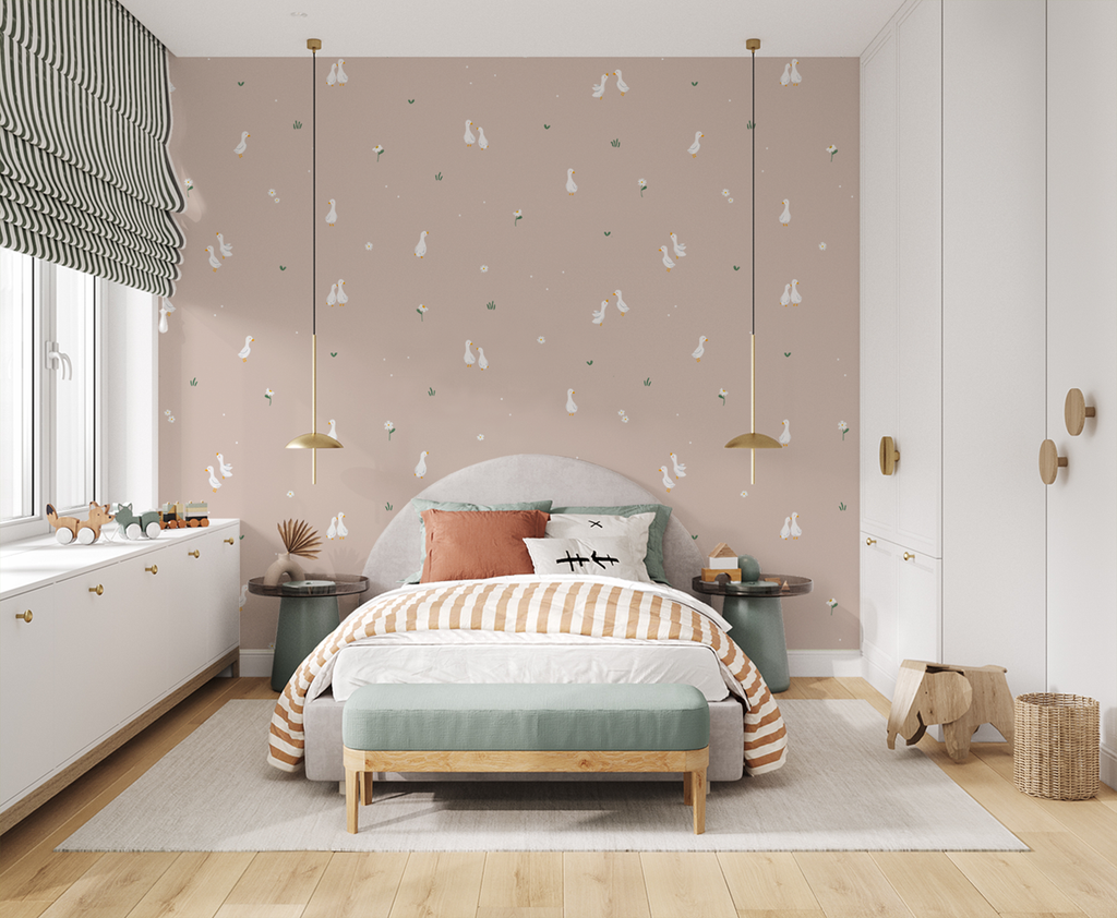 Bedroom with brown Graceful Geese wallpaper, gray bed, striped bedding, pendant lights, wooden accents, and playful decor.