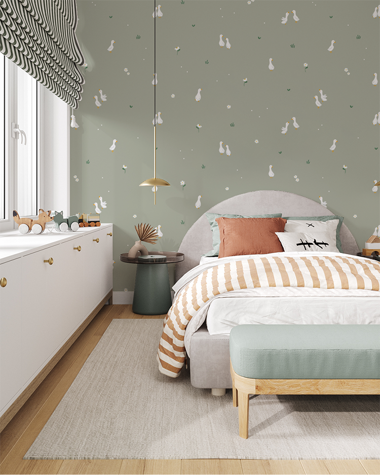 Bedroom with green Graceful Geese wallpaper, gray bed, striped bedding, pendant lights, wooden accents, and playful decor.