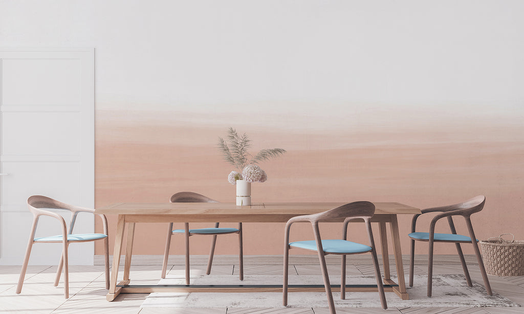 Gradient Ombre, Mural Wallpaper  in Blush Pink enhancing a dining room’s ambiance with its smooth transition from pale pink to rich earthy brown. Paired with simple wooden furniture and minimalistic decor, it exudes serenity.