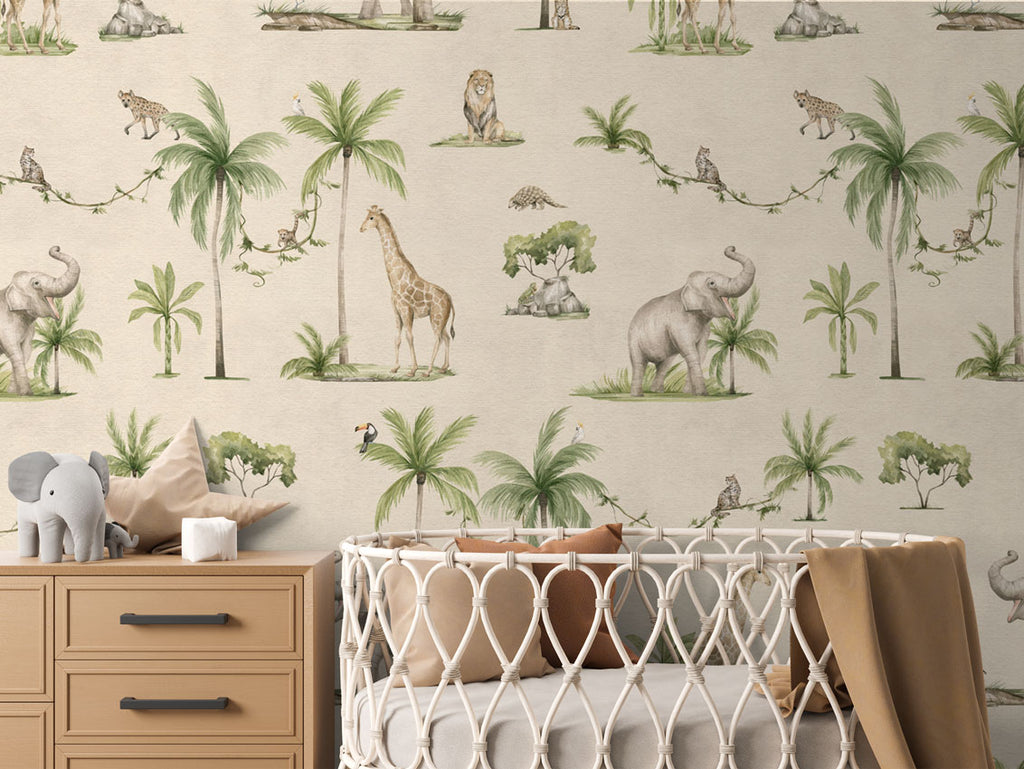 Joyful Jungle, Pattern Wallpaper in sand colourway. The nursery room includes a wooden dresser with an elephant plush toy, and a crib with a brown blanket.