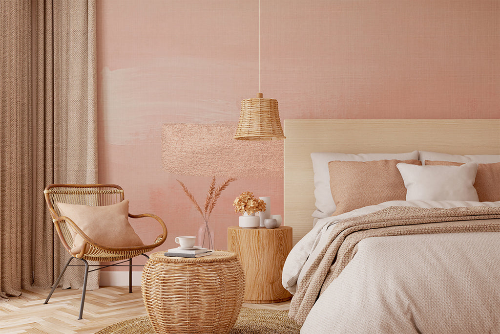 Serene bedroom featuring Le Montparnasse, Mural Wallpaper in soft pink, complemented by a wooden bed with beige linens, a wicker chair, and natural wood accents.