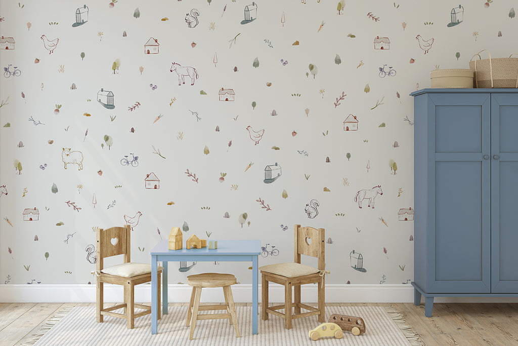 A children’s room adorned with a Mini Barnyard, Pattern Wallpaper, featuring delightful illustrations of farm animals, barns, and tractors. The room is furnished with a blue cabinet, wooden chairs, and a table set with toys.