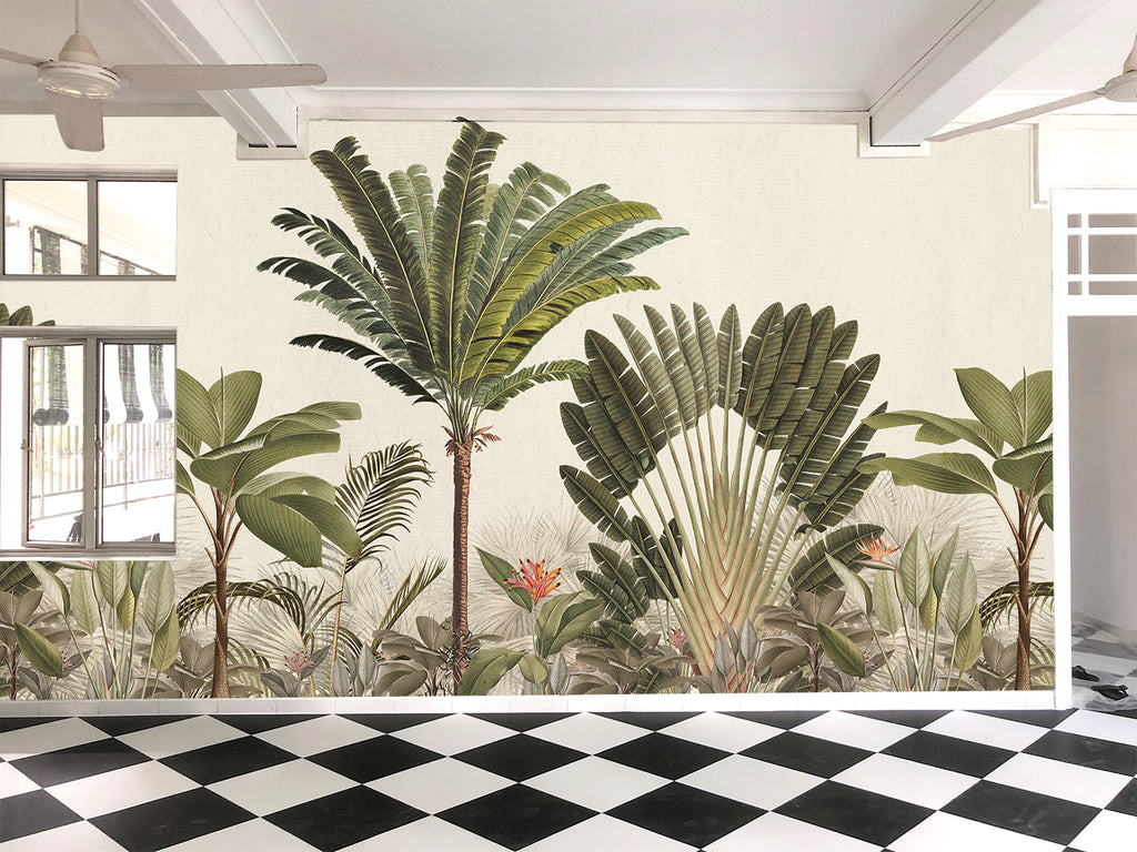 Room adorned with Palm Paradise, Tropical Mural Wallpaper in Honey, featuring lush palm trees and tropical foliage in honey green hues against a light backdrop, creating a serene, tropical oasis.