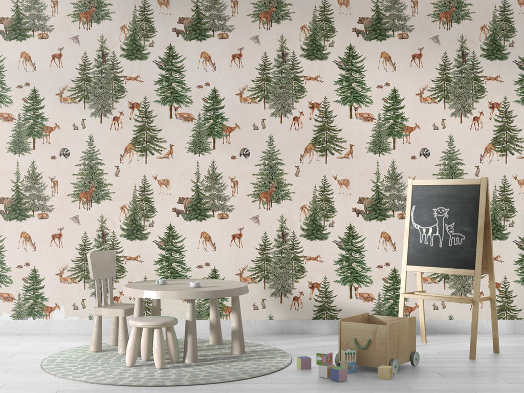 Pine Forest Pattern Wallpaper in white colourway. The room features a children's play area with a small round table, two chairs, a chalkboard with a drawing of a cat and kitten, a wooden toy box on wheels, and colorful blocks on the floor. 