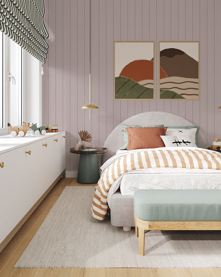 Inviting bedroom adorned with Dusty Pink Shiplap, Vertical Striped Wallpaper. The room features a cozy bed with striped bedding, abstract wall art, a plush bench, and a dresser filled with toys, creating a harmonious and well-decorated space.