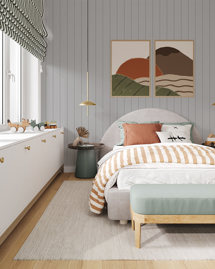 Inviting bedroom adorned with Grey Shiplap, Vertical Striped Wallpaper. The room features a cozy bed with striped bedding, abstract wall art, a plush bench, and a dresser filled with toys, creating a harmonious and well-decorated space.