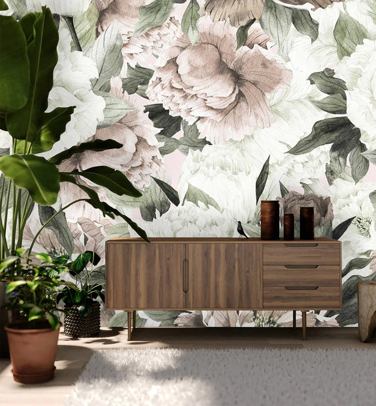 A modern room with a wooden sideboard and lush potted plants, enhanced by the botanical theme of the Tilda Vintage Roses, Mural Wallpaper