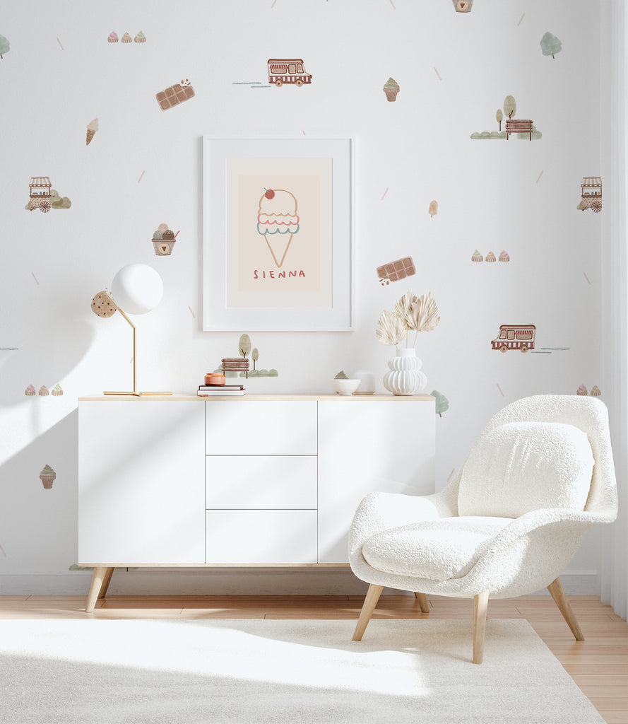 Sweet Treats in the park wallpaper with light coloured sideboard and a white lounge chair