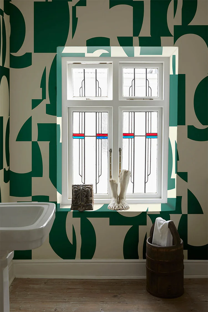 Slow Assembly, Geometric Pattern Wallpaper in Green featured on the wall with a window