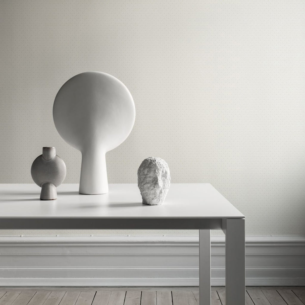 Bokal, Pattern Wallpaper in Sand featured on a wall of a room with a white table and white furniture on top