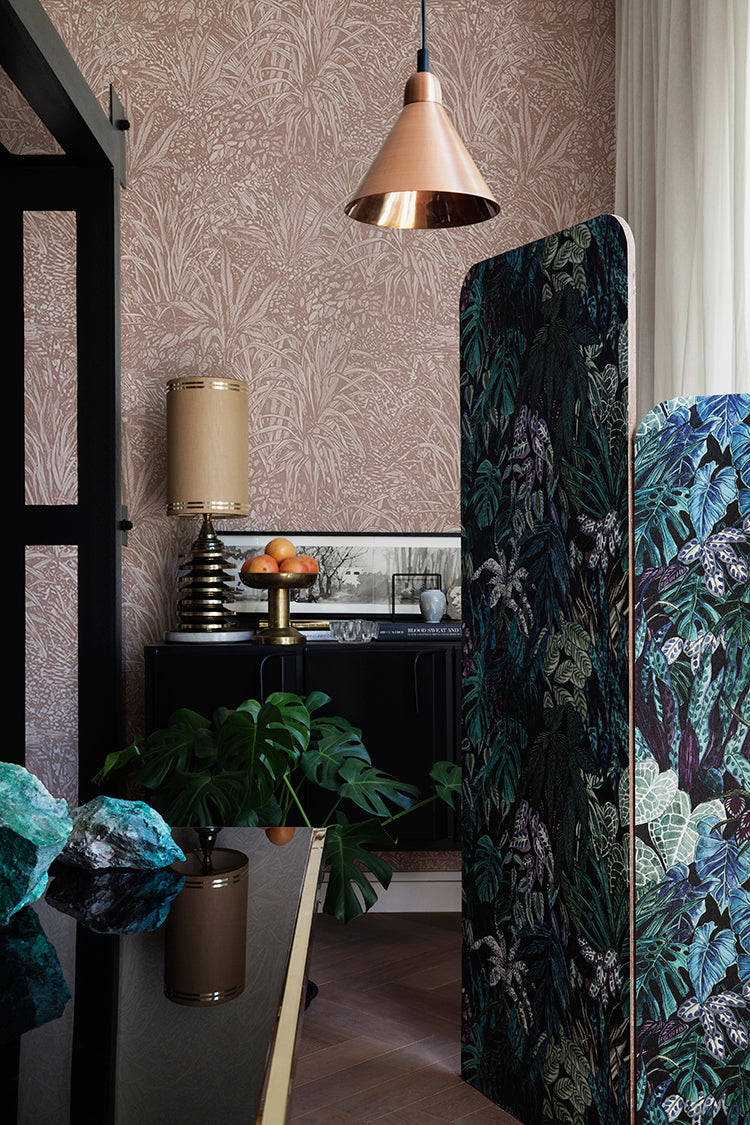 Amazon, Botanical Pattern Wallpaper in blush pink featured in a room with glass table, a pendant light, and wooden flooring
