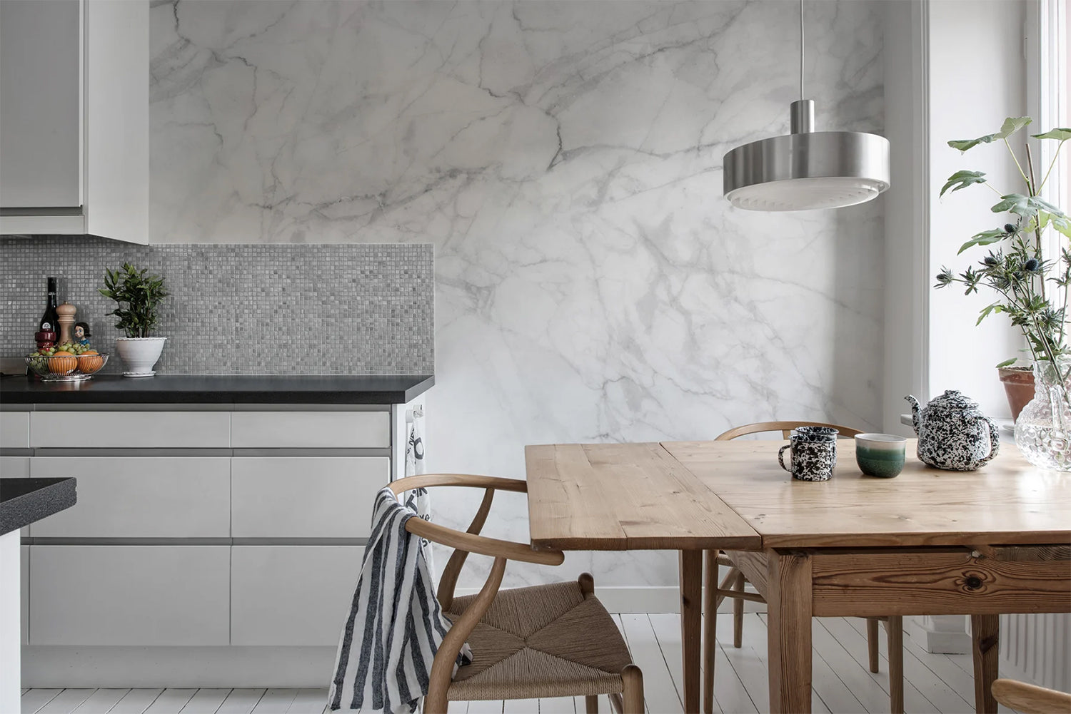 Marble Art, Texture Wallpaper, featured in a cozy modern kitchen and dining area with wooden furnishing on the dining set and granite on the countertop.