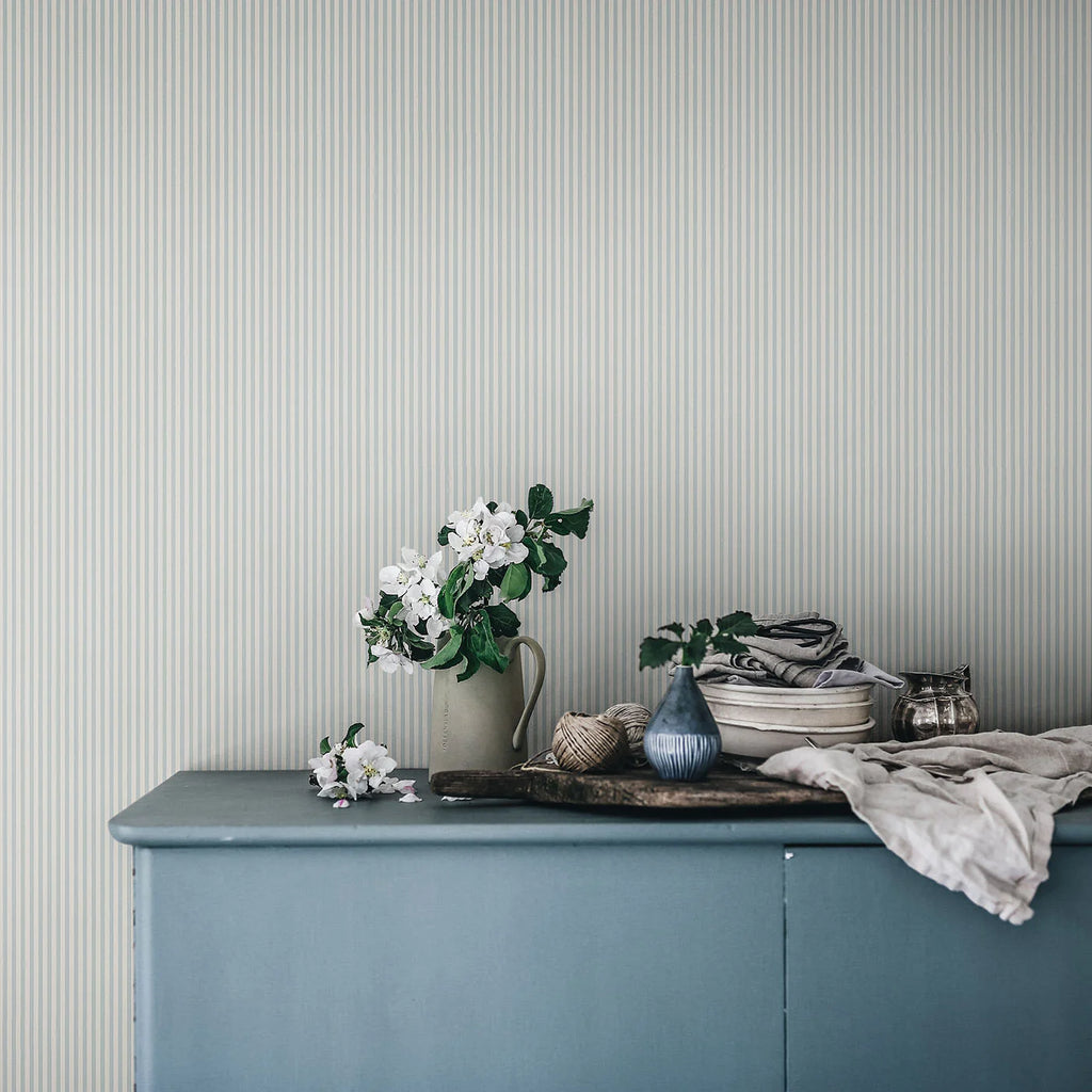 Laura stripes wallpaper - vertical stripes make a small condo feel taller and more spacious