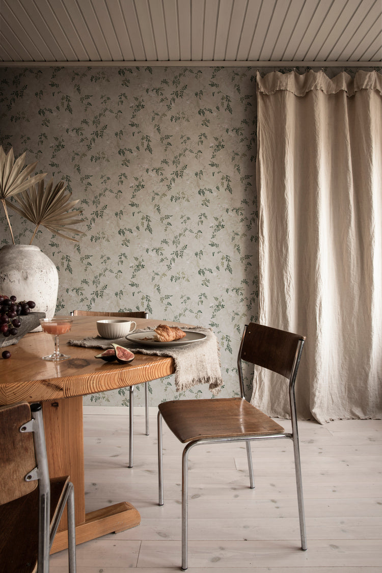 HC-Irene_Floral_Pattern_Wallpaper-Green-Interior1-05012024.jpg Irene, Floral Pattern Wallpaper in dining room with wooden table