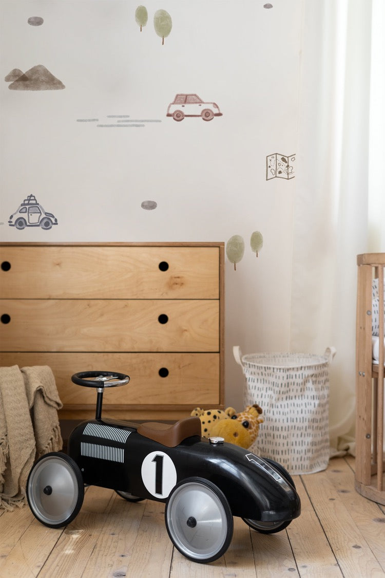 Mini roadtrippers wallpaper in a room with furnishings and a kids' car in the room