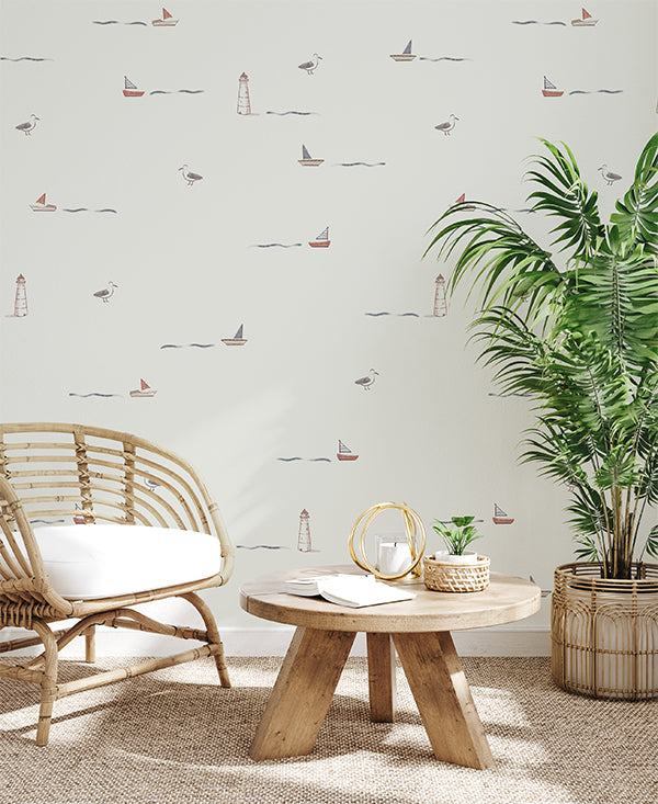 Mini Seafarer wallpaper in a lounge area with light wooden furnishings