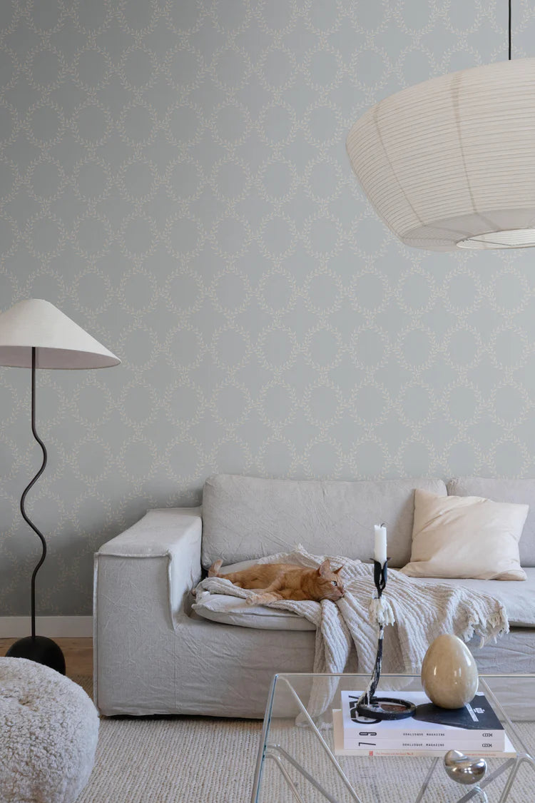 Wilma Wreath, Pattern Wallpaper installed in scandinavian living room decorated with light grey linen sofa