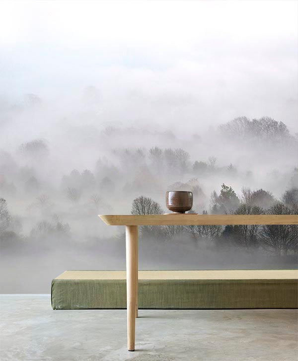 smokeywpprclassicstyleroomnew.jpg Misty Mornings, Landscape Mural Wallpaper, in a cosy living room, with a warm cup resting on a wooden table.