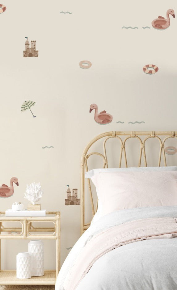 Beach themed wallpaper design in a bedroom with rattan furniture