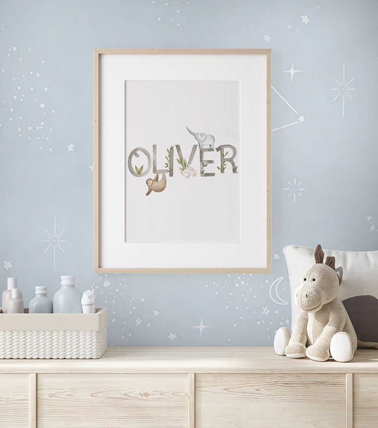 A tranquil room bathed in soft light, featuring Chalky Stars, Pastel Pattern Wallpaper in Blue. The room is tastefully decorated with a wooden dresser, on which rest a few vases. A plush toy adds a touch of warmth.