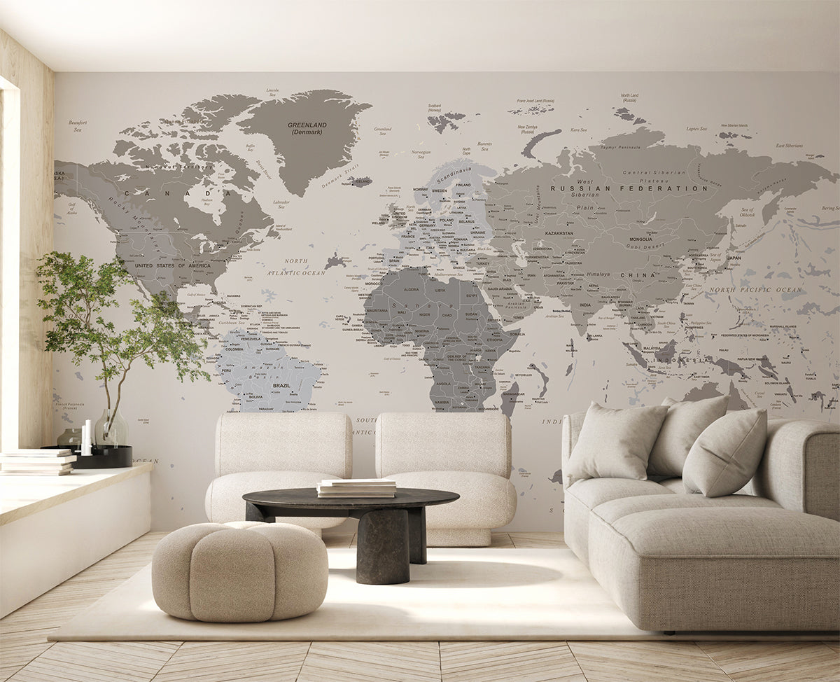 atlas wallpaper in living area against grey sofa